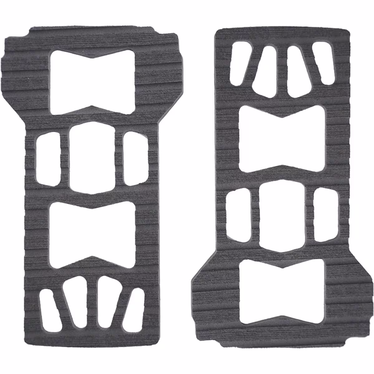 Close-up of a black Spark Baseplate Pad, a textured rubber mat designed for grip and protection.