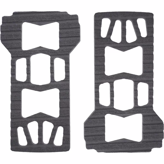 Close-up of a black Spark Baseplate Pad, a textured rubber mat designed for grip and protection.
